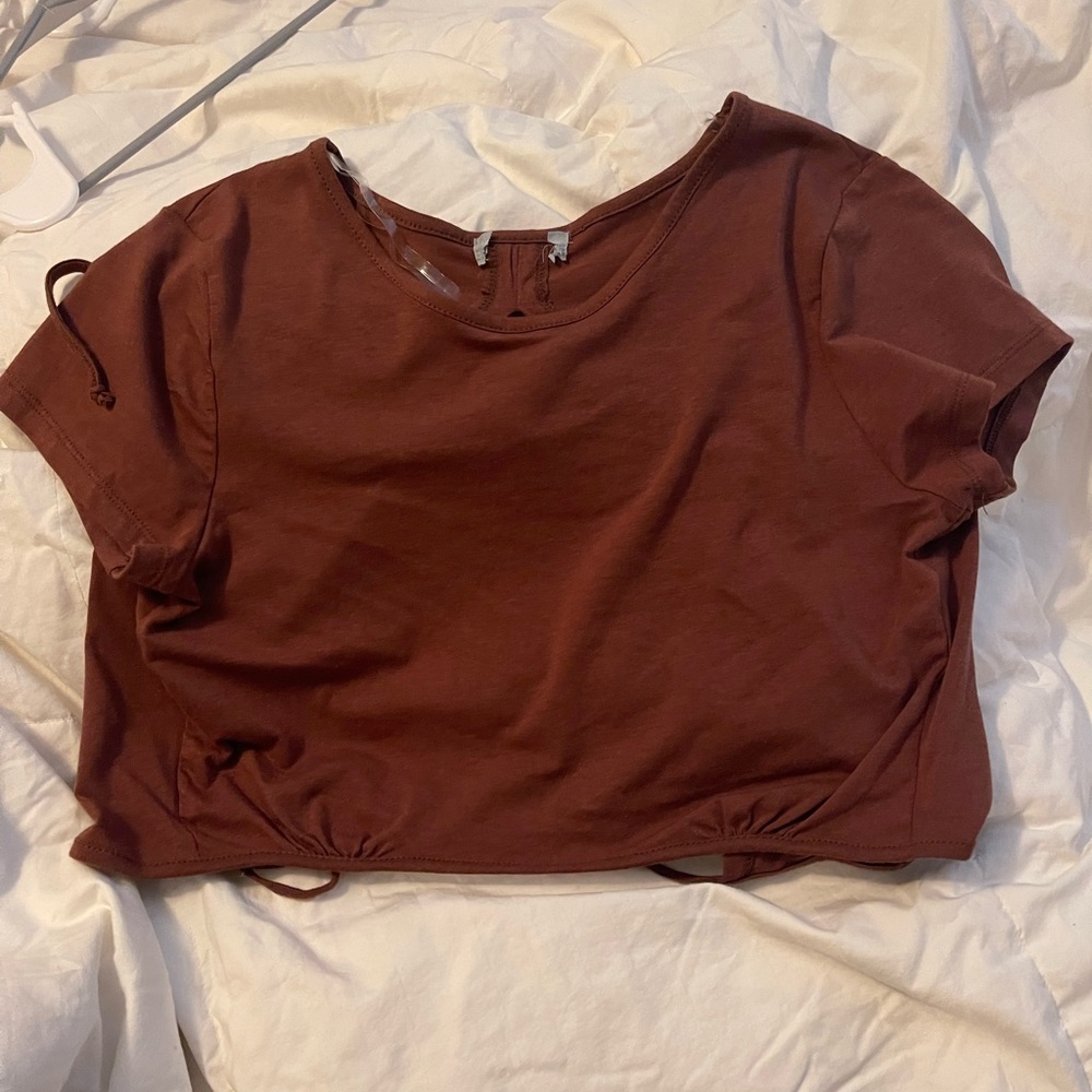 I’m selling a brown backless top